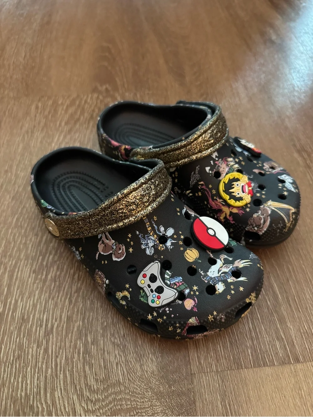 CROCS Black Glitter-Trim Character Print Clogs